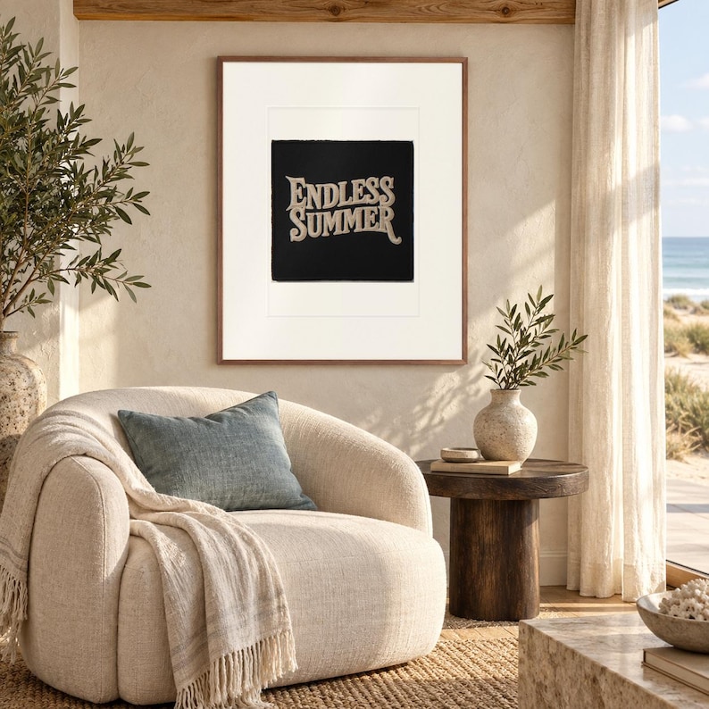 Endless Summer Patch print in a Red Oak frame with a white mat in a light-filled coastal sitting room.