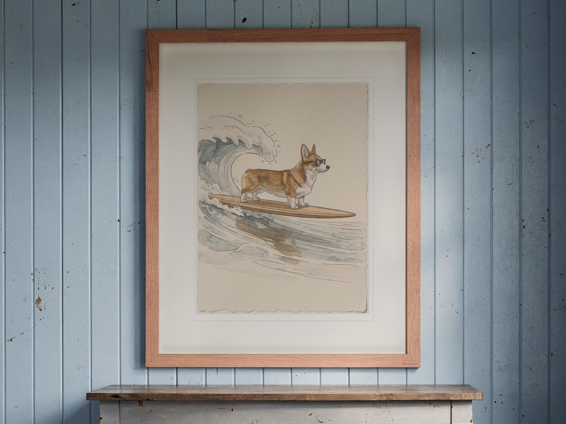 Corgi Surfing print in a Red Oak frame with a white mat, hanging above the console in a beach cottage entryway.