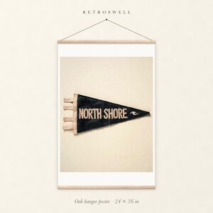 North Shore, Oahu Surf Pennant oak hanger poster, 24 by 36 inches, with natural wood rails and a hanging cord.