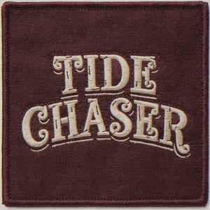 Tide Chaser embroidered-style patch unframed printed artwork and full composition with its paper border.