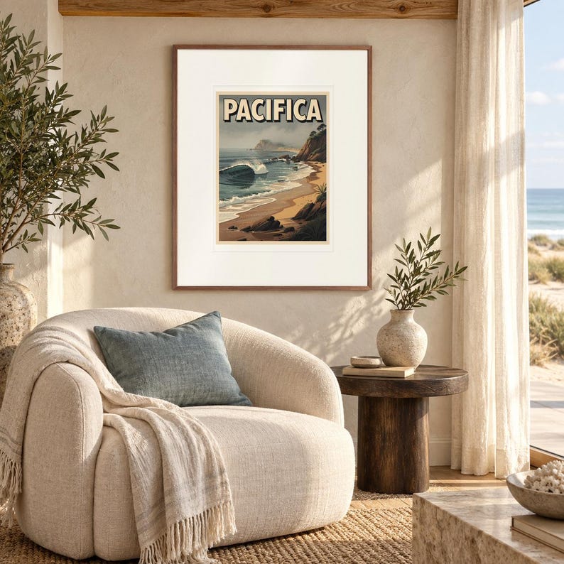 Pacifica Surf print in a Red Oak frame with a white mat in a light-filled coastal sitting room.