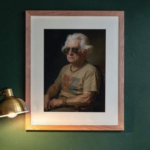 Thomas Jefferson print in a Red Oak frame with a white mat, hanging above the desk in a green study.