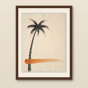 Sumi-e Lone Palm with Sunset Accent Print - walnut framed art print with cream mat on plaster wall