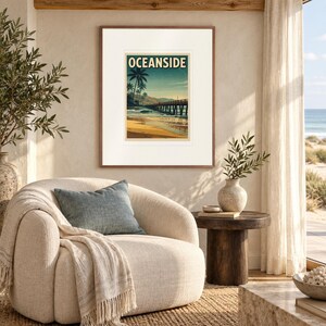 Oceanside California Surf print in a Red Oak frame with a white mat in a light-filled coastal sitting room.