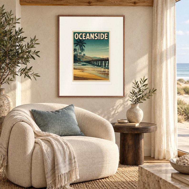 Oceanside California Surf print in a Red Oak frame with a white mat in a light-filled coastal sitting room.