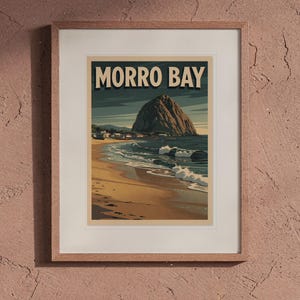 Morro Bay Surf Travel Poster print in a Red Oak frame with a white mat, hanging above the table in a boho living room.