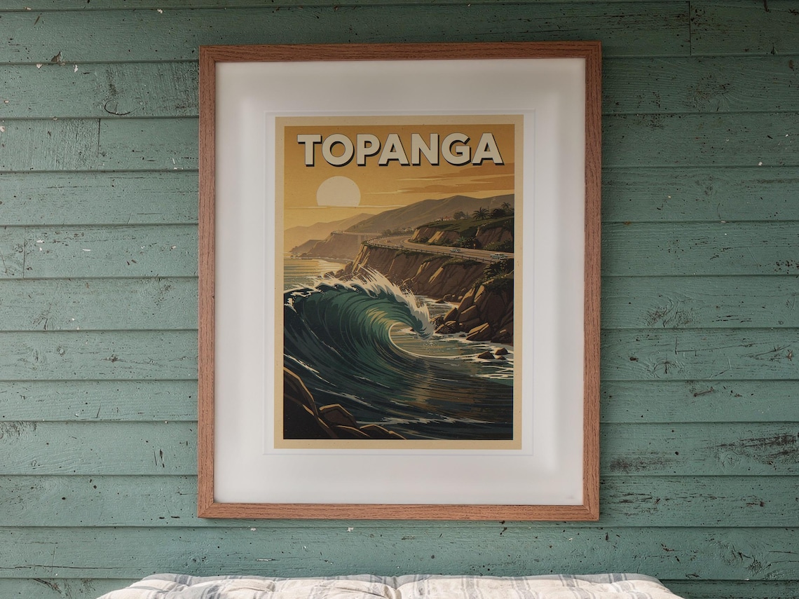 Topanga Surf Travel Poster print in a Red Oak frame with a white mat, hanging above the bench in a screened beach porch.