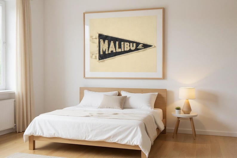 Malibu Vintage Surf Pennant Print framed in a modern bedroom setting