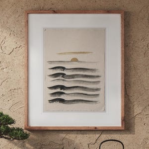 Layered Waves Ink Style print in a Red Oak frame with a white mat, hanging above the cabinet in a tea room.