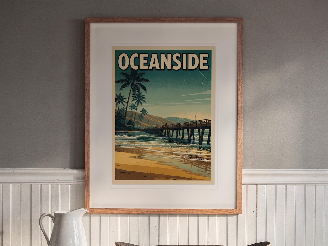 Oceanside California Surf Travel Poster print in a Red Oak frame with a white mat, hanging above the buffet in a dining room.