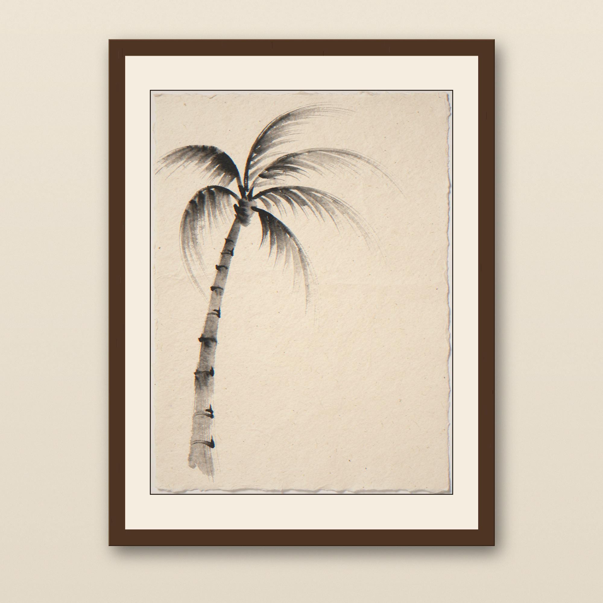 Sumi-e Lone Palm Print - walnut framed art print with cream mat on plaster wall