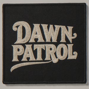 Dawn Patrol embroidered-style patch unframed printed artwork and full composition with its paper border.