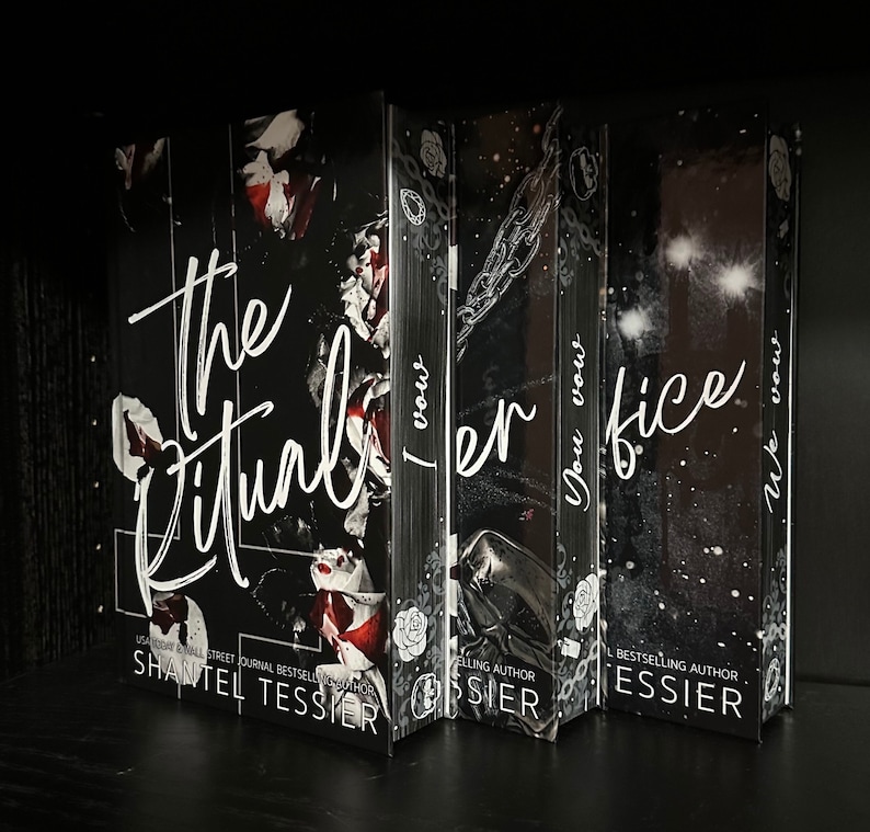 May include: A set of four paperback books with black covers and white text. The titles are "The Ritual", "I Vow", "You Vow", and "We Vow". The author's name is Shantel Tessier.