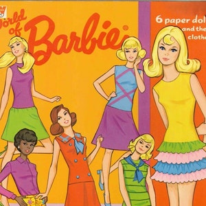 May include: A vintage book cover featuring six paper dolls of Barbie and their clothes. The cover is yellow with the words "World of Barbie" in red and white. The dolls are dressed in colorful outfits, including a purple dress, a yellow dress, a blue and white dress, a red dress, a green and white dress, and a pink and blue dress.