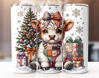 May include: A white tumbler featuring a cartoon calf wearing overalls and a bow, surrounded by a Christmas tree, presents, and snowflakes. The calf has brown and white fur and large eyes. The tumbler is approximately 8 inches tall.