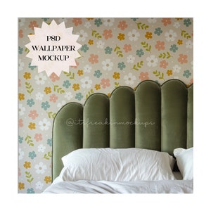 May include: A green velvet headboard with a scalloped design, set against a wall with a floral wallpaper pattern in shades of pink, blue, yellow, and white. The text "PSD WALLPAPER MOCKUP" is visible in a white starburst shape.