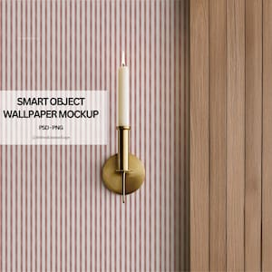 May include: A burning white candle in a gold wall sconce. The sconce has a circular base and a vertical candle holder. The background features striped wallpaper with white and mauve stripes, and a wooden panel.