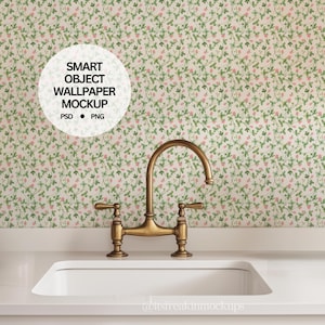 May include: A kitchen scene featuring a white sink and a brass faucet against a backdrop of wallpaper. The wallpaper has a pattern of green leaves and pink flowers. The text "SMART OBJECT WALLPAPER MOCKUP" is in a white circle.