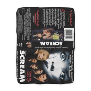 May include: A VHS tape for the movie "Scream" with a black and white cover featuring the film's title and cast. The tape has quotes like "Clever, Hip and Scary!" and "Sensational! Terrific Entertainment!"
