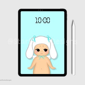 May include: A digital illustration of a white baby doll with blue bows on a light blue background. The doll is wearing a white hooded outfit with bunny ears. The time 10:00 is displayed on the screen.