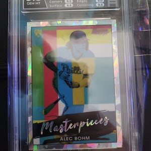Alec boom Atomic Refractor  graded  9.5