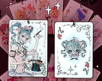 May include: A collection of rectangular acrylic keychains featuring anime-style illustrations of characters in playing card designs. One keychain shows a character with teal hair pulling a white rabbit from a top hat, while another displays an Ace of Hearts.