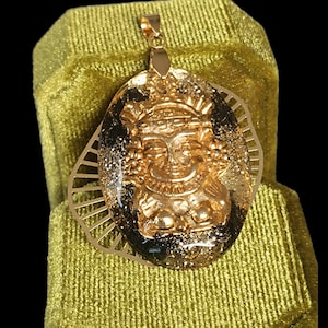 Superb Maya pendant revisited Original creation in resin and gold stainless steel, guaranteed to be a favorite!