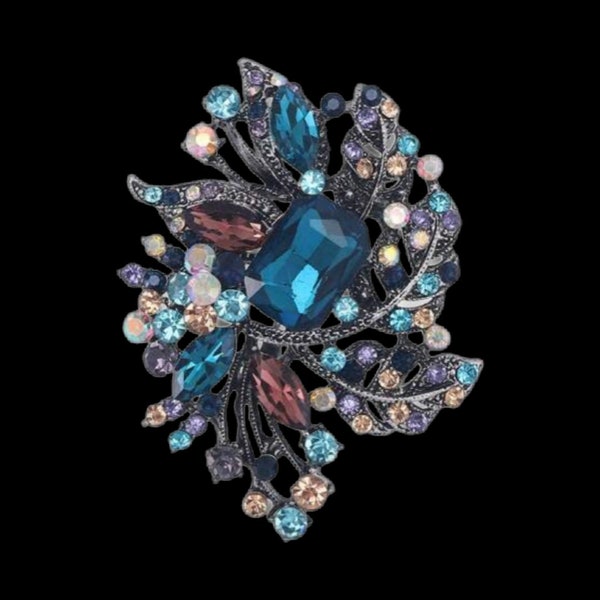 Superbe grande broche en forme de feuille esprit vintage et fleuris neuve de qualité de couleur argent antique sertie cristal bleu et strass