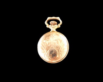 Old gold-plated pocket watch sure to love you!