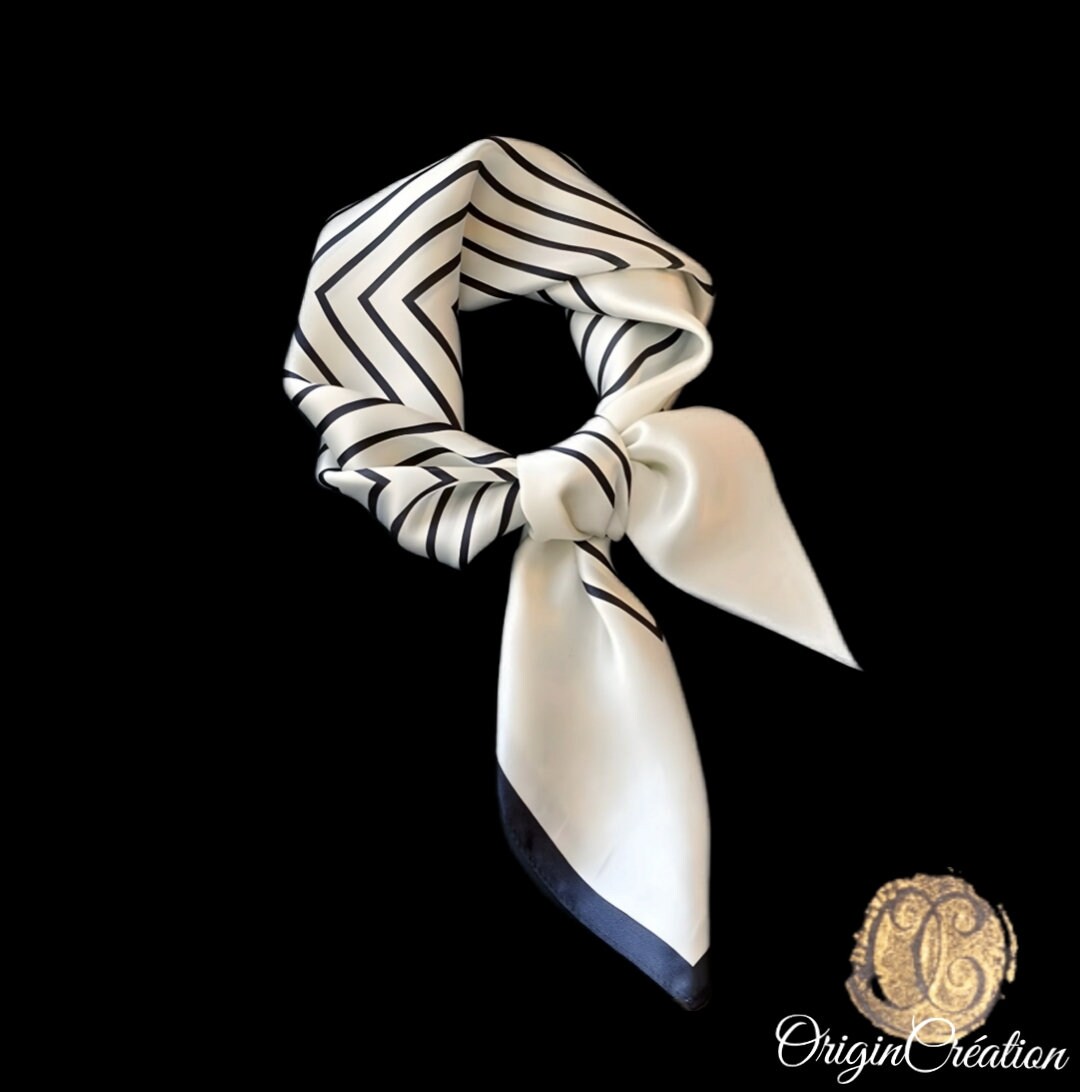 Very beautiful quality satin scarf in white and black with elegant geometric patterns in the haute couture spirit. Guaranteed to be a favorite