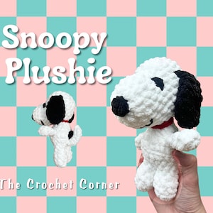 May include: Handmade Snoopy plushie in white, black, and red. The plushie has a red collar and black ears. The text "Snoopy Plushie" is displayed above the plushie, and "The Crochet Corner" is displayed below.
