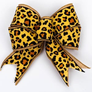 Laço de leopardo | Laço com estampa de animal | Laço com guirlanda selvagem | Laço com tema de safári | Laço com decoração de selva | Laço com estampa de chita | Laço de leopardo | Laço com animal ousado