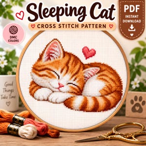 Könnte beinhalten: Ein Kreuzstichmuster mit einer schlafenden orangefarbenen getigerten Katze und einem kleinen roten Herz darüber, präsentiert in einem runden Holzstickrahmen. Das Design enthält den Text Sleeping Cat Cross Stitch Pattern und PDF Instant Download.