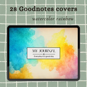 May include: A digital tablet displaying a watercolor rainbow background with the text "MY JOURNAL" and "Everyday is a good day" in a white box. The image is titled "28 Goodnotes covers watercolor rainbow".