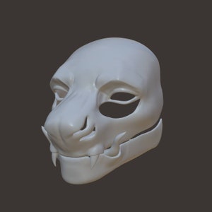 May include: A white, unpainted, plastic mask with a feline design. The mask is in two pieces, with the lower jaw section separate from the upper part. The mask has a detailed snout, fangs, and eye sockets.