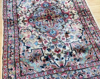 Vintage Pakistani silk and wool rug Persian central medallion design