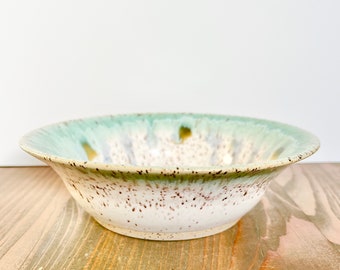 Ceramic bowl, white with drippy green/blue/amber