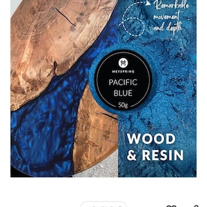 May include: A close-up of a wood and resin product. The wood has a natural grain, and the resin is a vibrant Pacific blue. The product is labeled "MEYSPRING PACIFIC BLUE 50g" and "WOOD & RESIN."