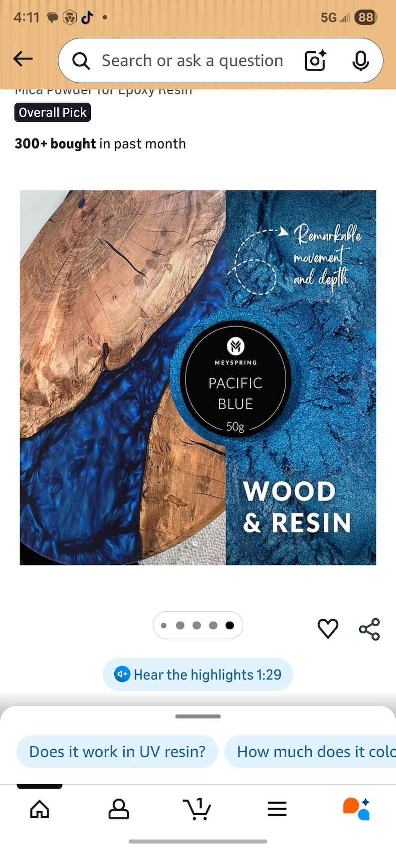 May include: A close-up of a wood and resin product. The wood has a natural grain, and the resin is a vibrant Pacific blue. The product is labeled "MEYSPRING PACIFIC BLUE 50g" and "WOOD & RESIN."