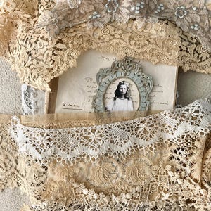 Antique and vintage lace and trim grab bulk bag. 5 samples of different designs. cotton, linen and silk appliques. saved from old clothes.