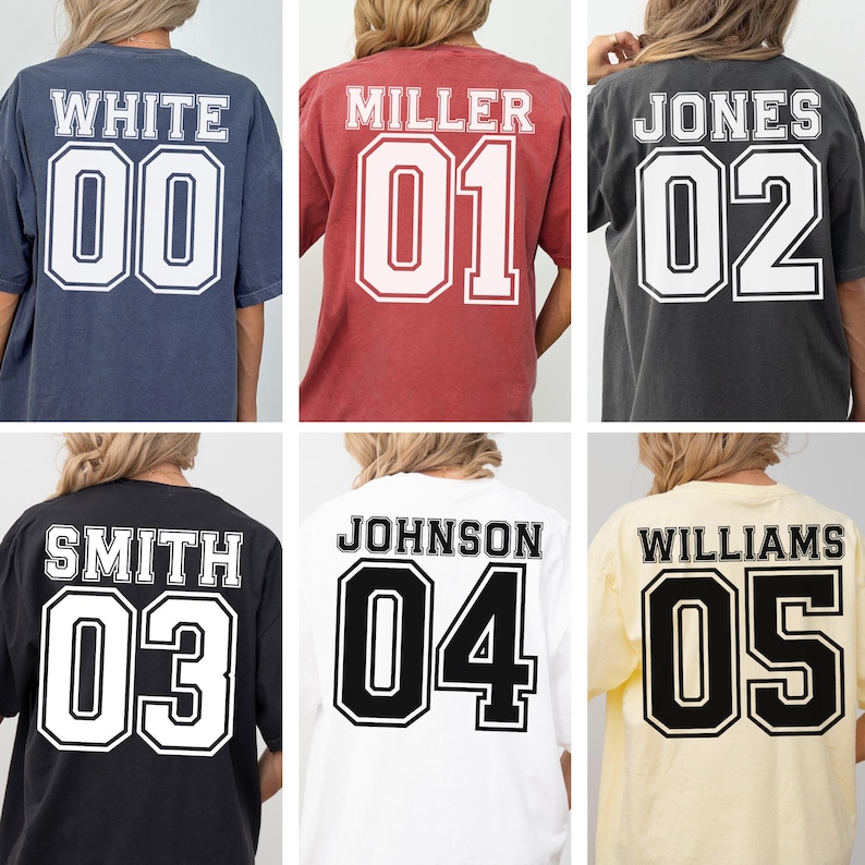 May include: Six t-shirts in various colours, including navy, red, charcoal, black, white, and yellow, are shown. Each shirt has a name and number printed on the back in a collegiate style font, with the numbers outlined in black.