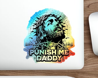 May include: A colourful sticker featuring a black and white image of Jesus Christ wearing a crown of thorns. The text "PUNISH ME + DADDY +" is written below the image.