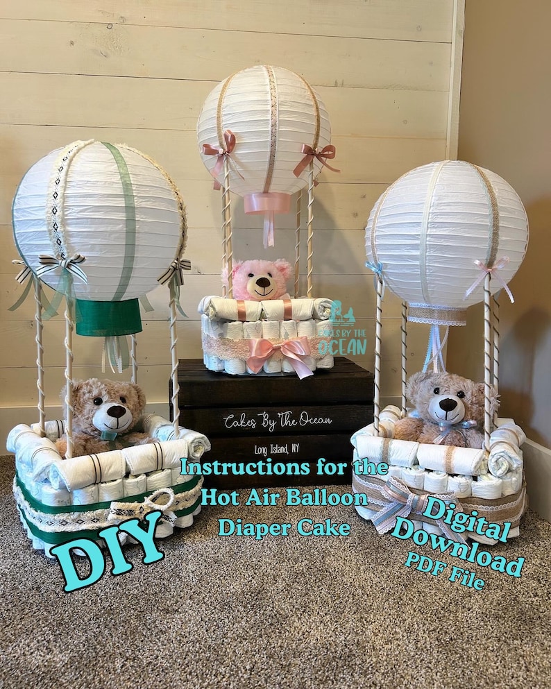 May include: DIY instructions for a hot air balloon diaper cake. The cake is made of diapers, ribbon, and a teddy bear. The instructions are available as a digital download.