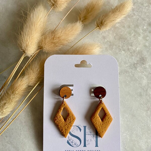 Ochre limestone textured diamond shape donut earrings with round walnut and stainless steel studs