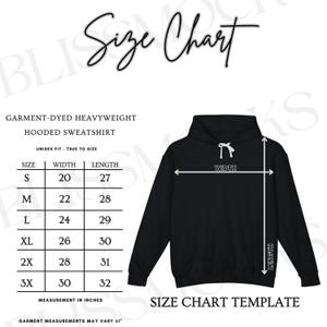 May include: A black hooded sweatshirt with a size chart template. The chart shows measurements in inches for sizes S to 3X, including width and length. The text reads "GARMENT-DYED HEAVYWEIGHT HOODED SWEATSHIRT" and "UNISEX FIT - TRUE TO SIZE."