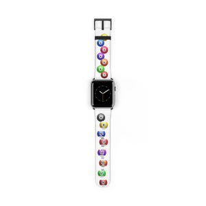 May include: White Apple Watch band with a pattern of billiard balls numbered 1 through 15. The band is made of silicone and has a black buckle.