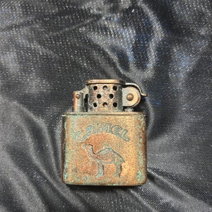 Vintage camel flip style cigarette lighter copper bronze