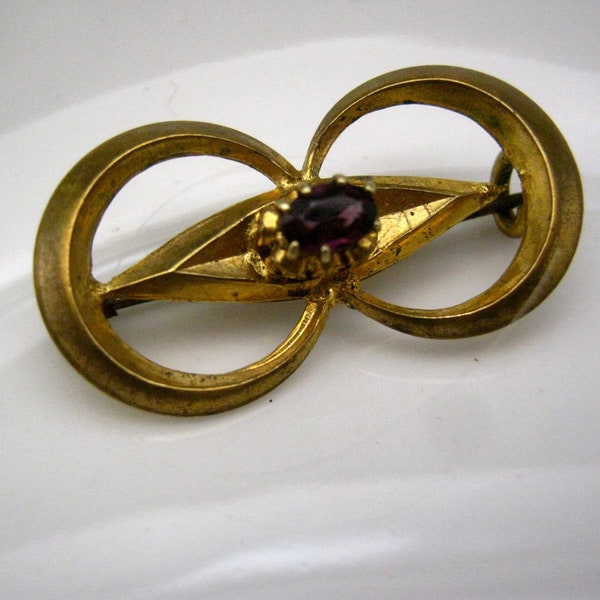 Antique elegant fashion french golden brooch with purple cabochon. Vtg jewelry collectible