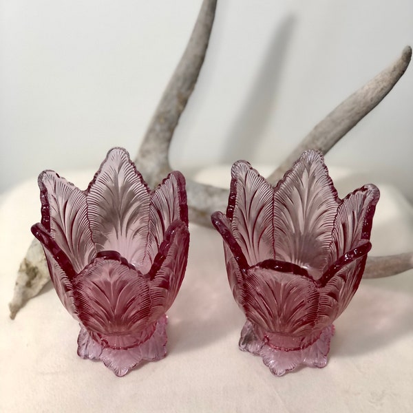 Vintage pink glass multi-use candle holders.