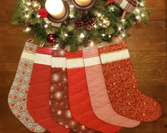 Handmade Christmas Stockings with Cross Stitch Personalization. Stockings are quilted and fully lined.  Large size holds lots of goodies!